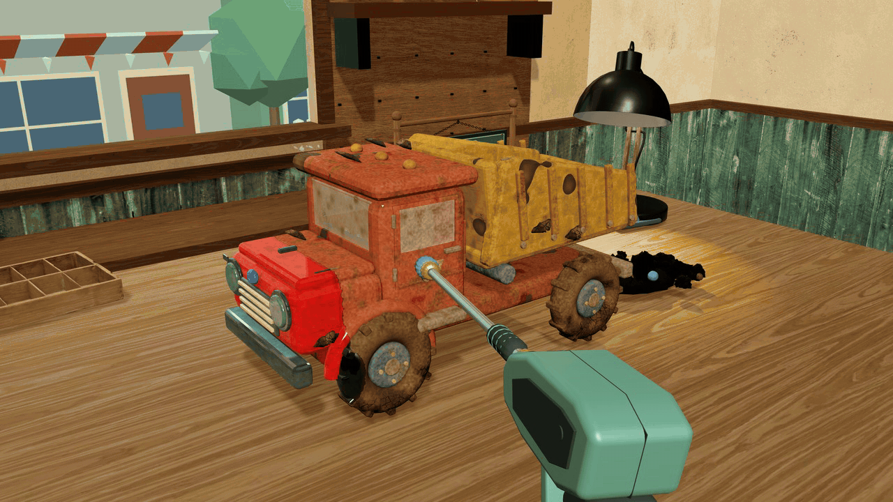 The pressure rinse cutting clean lines through the mud on a red toy truck, revealing the paint