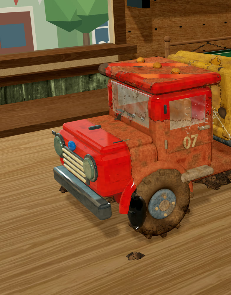 The rinse jet cutting a clean stripe through mud on the red truck